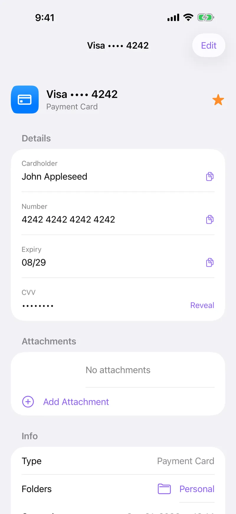 A payment card in Fydra on iPhone, showing cardholder, number, and expiry, with the CVV hidden behind Reveal.